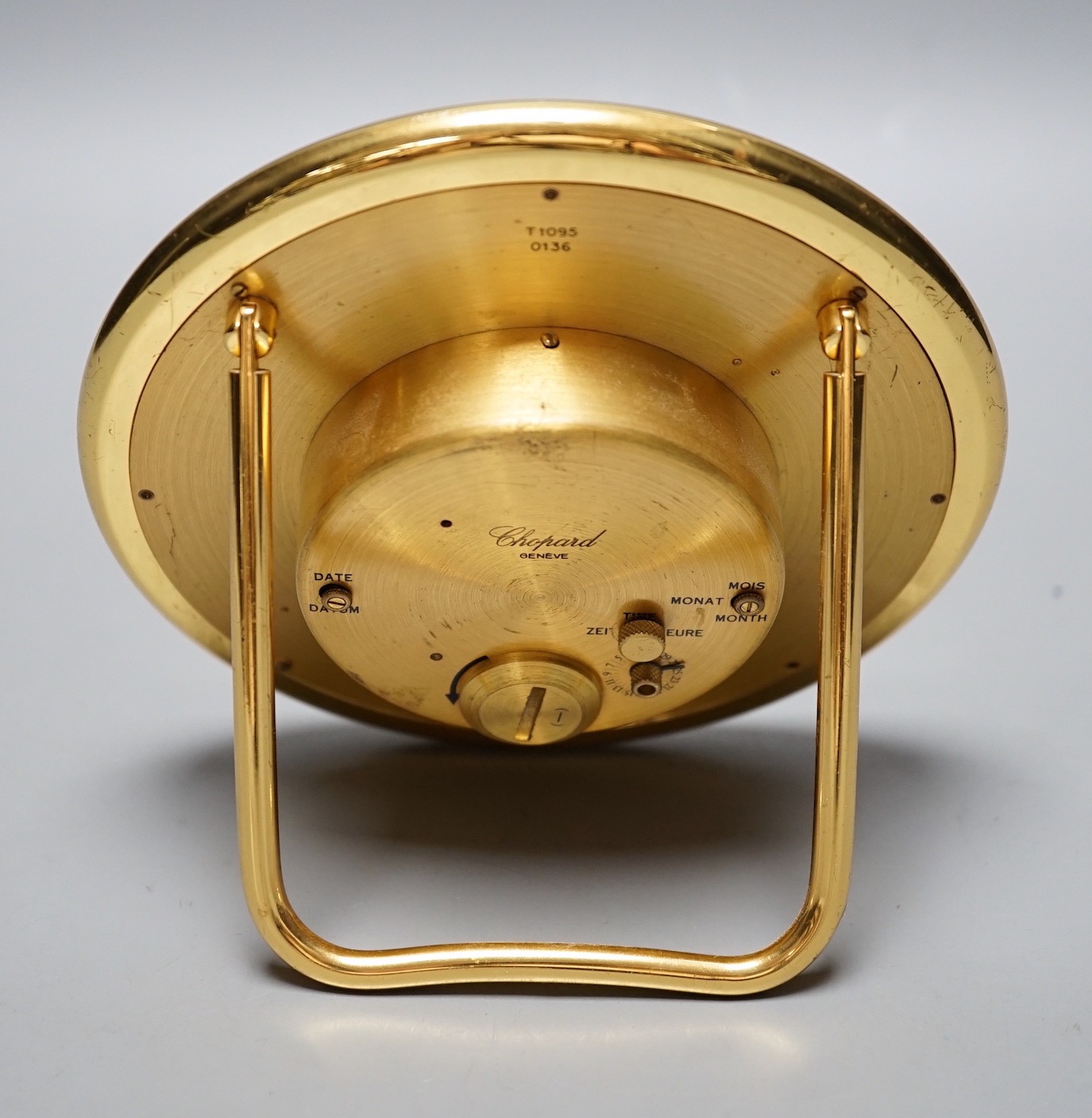 A Swiss Chopard travel desk alarm clock on stilt, 14cm diameter